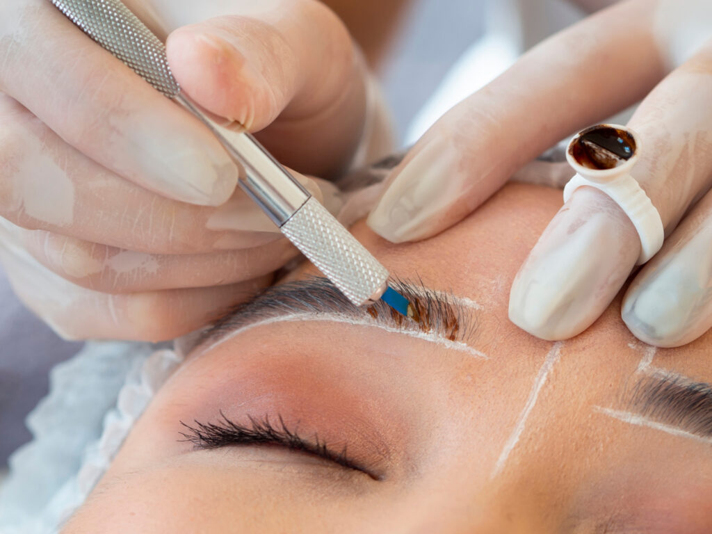 a customer is getting eyebrow embroidery in Toa Payoh